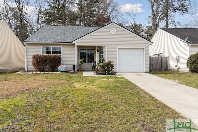 ranch-style home featuring fence, roof with shingles, a front yard, a garage, and driveway