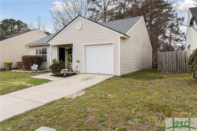 ranch-style home featuring a front yard, fence, roof with shingles, concrete driveway, and a garage