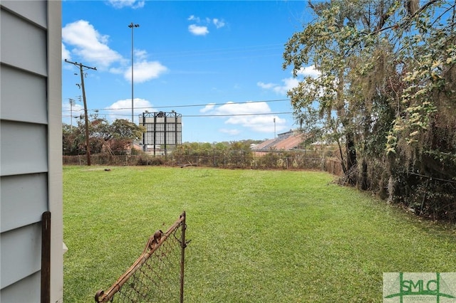 view of yard with fence
