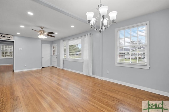 unfurnished living room featuring recessed lighting, light wood-style floors, and baseboards