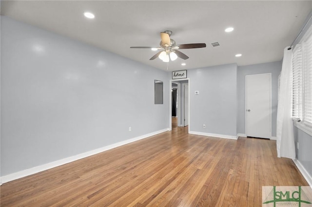 interior space with visible vents, a ceiling fan, wood finished floors, recessed lighting, and baseboards