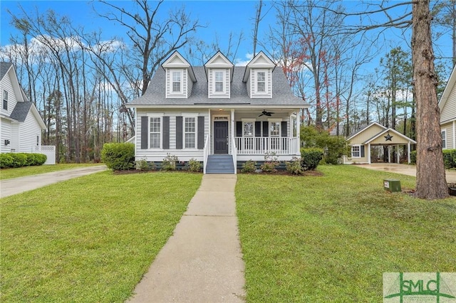 cape cod home with a front lawn, a porch, roof with shingles, crawl space, and ceiling fan