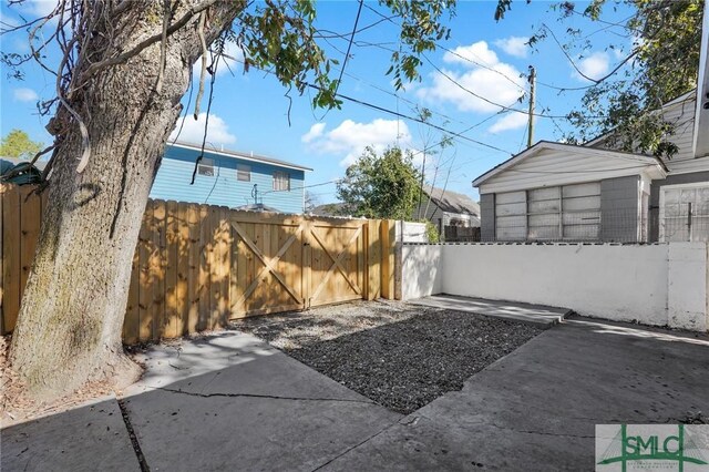 view of patio / terrace featuring fence