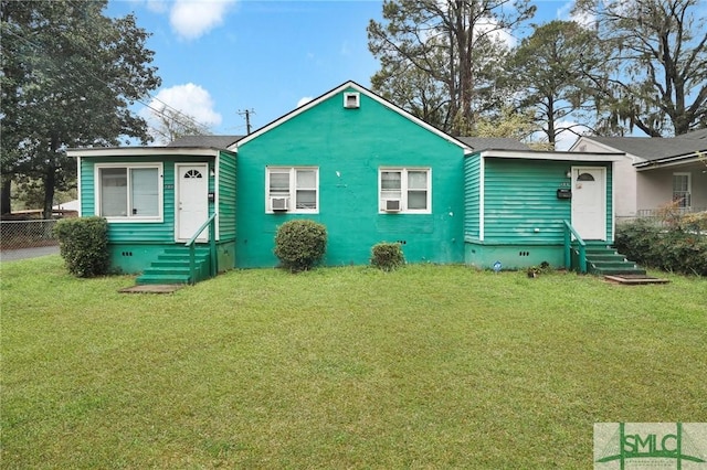 view of front of home featuring crawl space, a front lawn, and entry steps