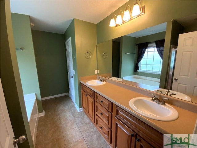 bathroom featuring a sink, baseboards, a bath, and double vanity