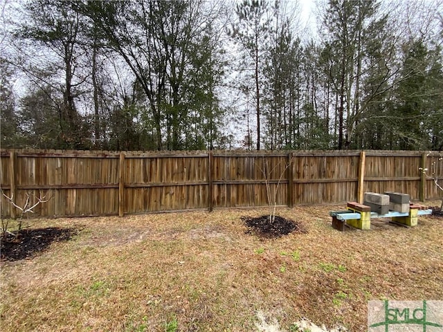 view of yard with fence