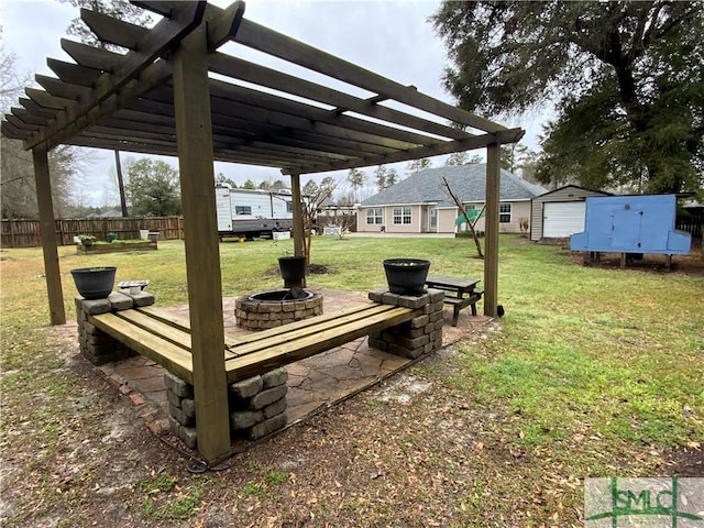 surrounding community with a lawn, an outdoor fire pit, fence, and a pergola