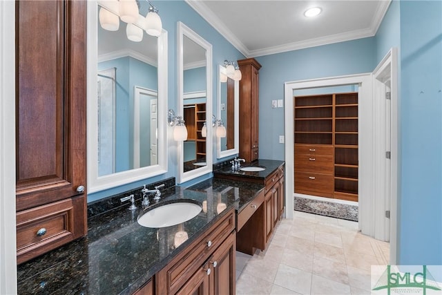 full bathroom featuring tile patterned flooring, ornamental molding, and a sink