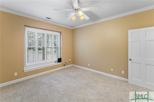 unfurnished room with visible vents, crown molding, and carpet