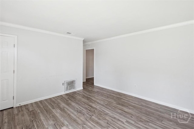 7014 Key St, Savannah, GA 31406 - empty room featuring wood finished floors, baseboards, and crown molding