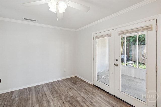 7014 Key St, Savannah, GA 31406 - unfurnished room featuring wood finished floors, french doors, a ceiling fan, ornamental molding, and baseboards