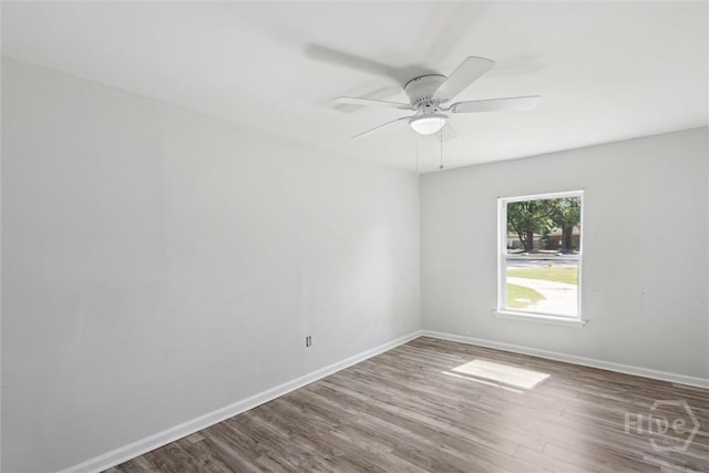 7014 Key St, Savannah, GA 31406 - unfurnished room featuring wood finished floors, baseboards, and a ceiling fan