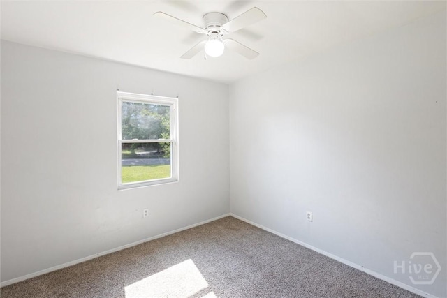 7014 Key St, Savannah, GA 31406 - empty room featuring carpet, a ceiling fan, and baseboards