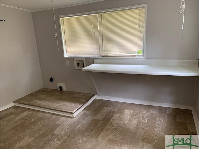 washroom with hookup for a washing machine, wood finished floors, laundry area, and electric dryer hookup