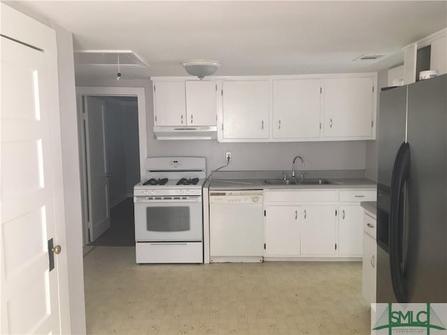 kitchen featuring under cabinet range hood, white appliances, white cabinetry, and a sink