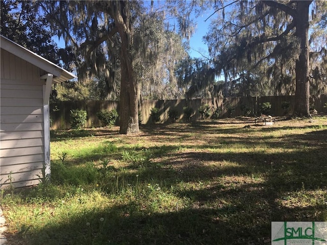 view of yard featuring a fenced backyard