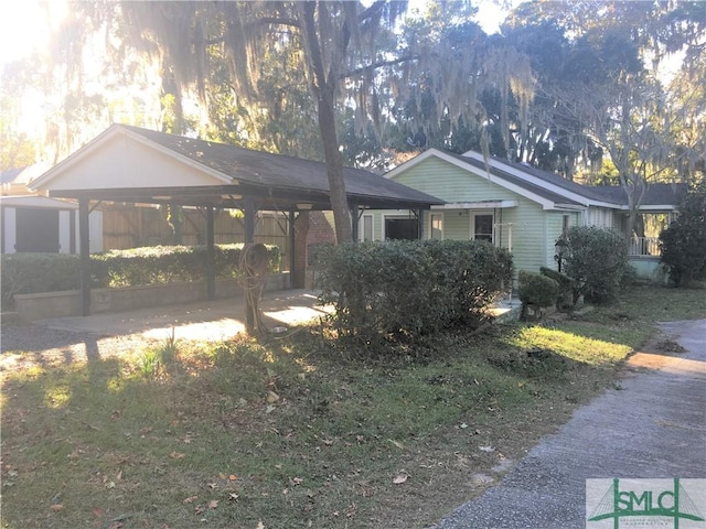 exterior space featuring a carport