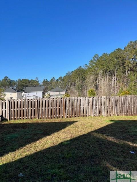 view of yard featuring fence