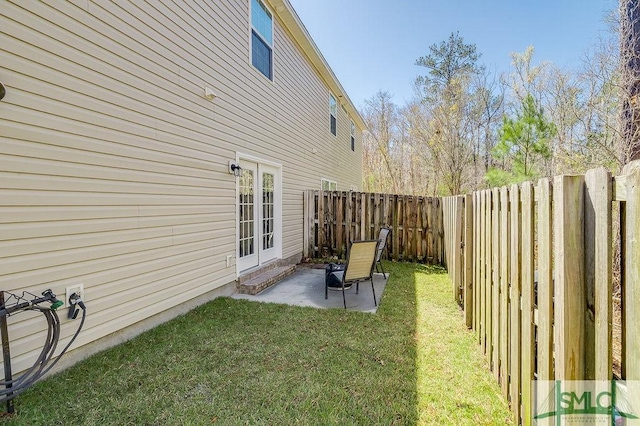 view of yard with a fenced backyard and a patio area