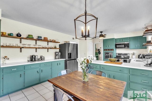 kitchen with a sink, open shelves, light tile patterned flooring, and stainless steel appliances