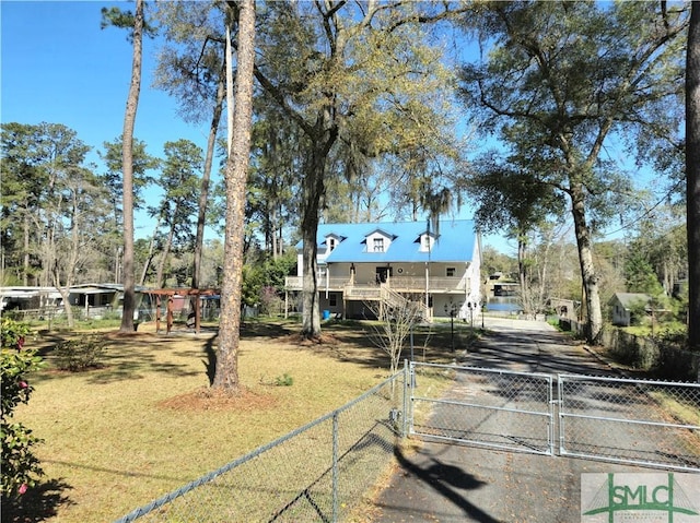 view of front of property with a gate and fence