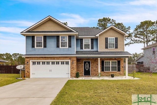 traditional-style home featuring brick siding, a front yard, and fence