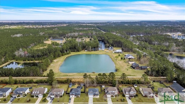 bird's eye view featuring a residential view and a water view