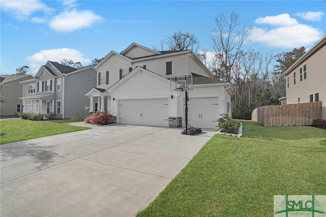 view of front of home featuring a front lawn, fence, a residential view, a garage, and driveway