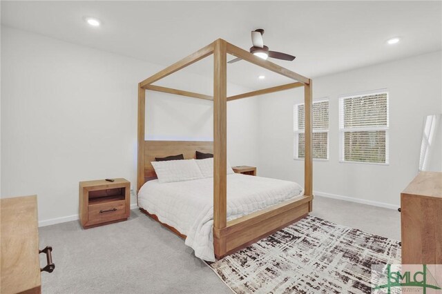 carpeted bedroom featuring recessed lighting, baseboards, and ceiling fan