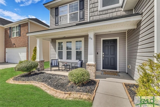 property entrance with covered porch