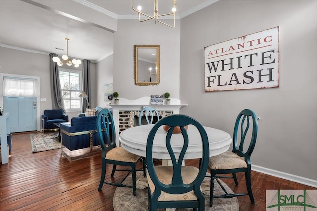 dining room featuring baseboards, crown molding, an inviting chandelier, and wood-type flooring