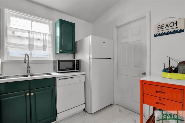 kitchen featuring marble finish floor, a sink, plenty of natural light, white appliances, and green cabinetry