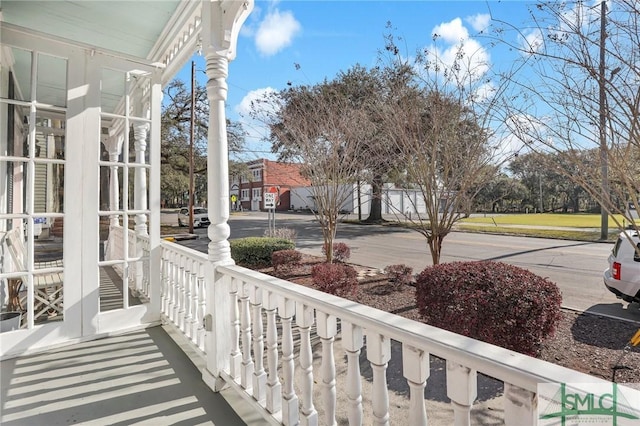 balcony featuring a porch