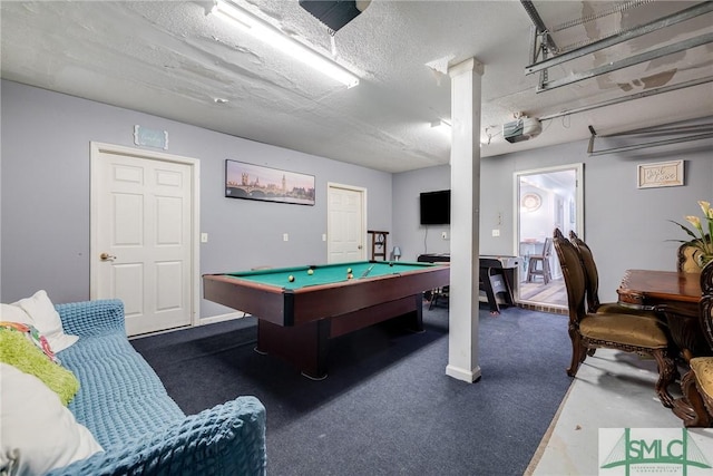 recreation room featuring a textured ceiling and pool table