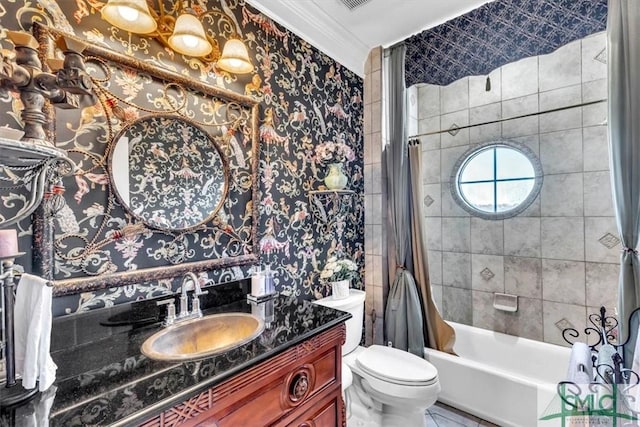 bathroom featuring vanity, crown molding, toilet, and shower / bathtub combination with curtain