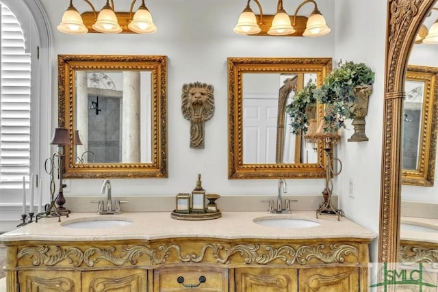 bathroom with double vanity and a sink