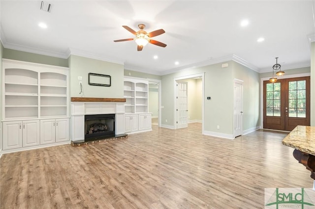 unfurnished living room featuring a ceiling fan, visible vents, baseboards, light wood-style floors, and french doors