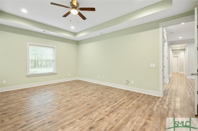 unfurnished room with visible vents, baseboards, ceiling fan, recessed lighting, and light wood-style flooring