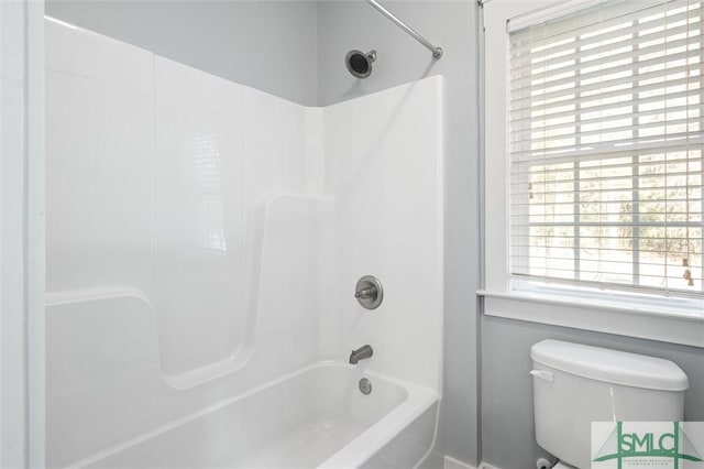 full bath with bathing tub / shower combination and toilet