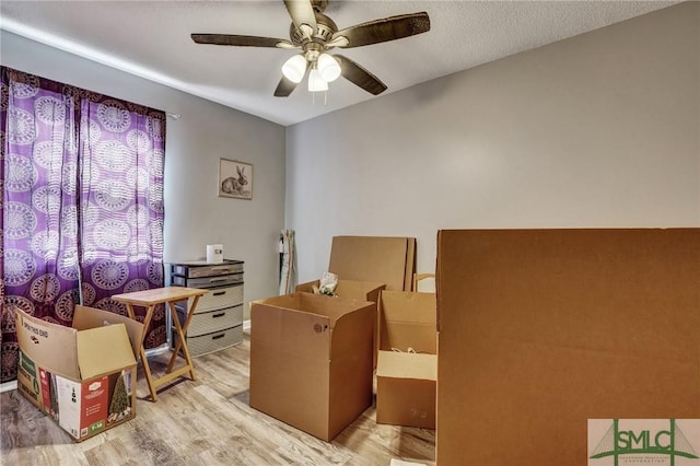 office with wood finished floors and ceiling fan