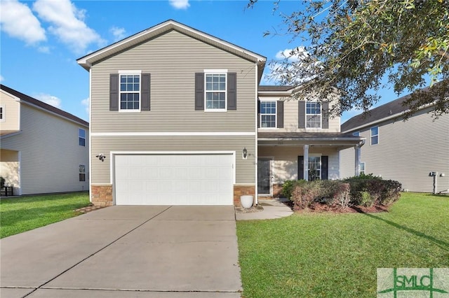 traditional-style house featuring a garage, stone siding, a front yard, and driveway