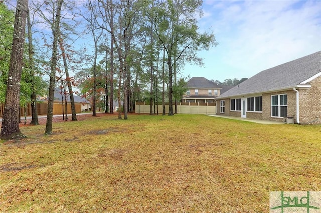 view of yard with fence