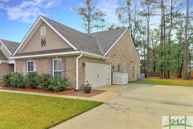 view of front of property featuring concrete driveway, a garage, brick siding, and a front yard