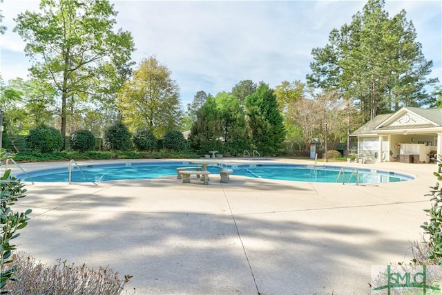 pool featuring a patio