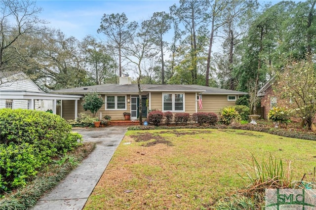 single story home with a front lawn and a chimney