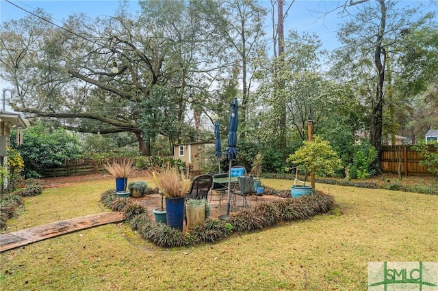 view of yard with fence