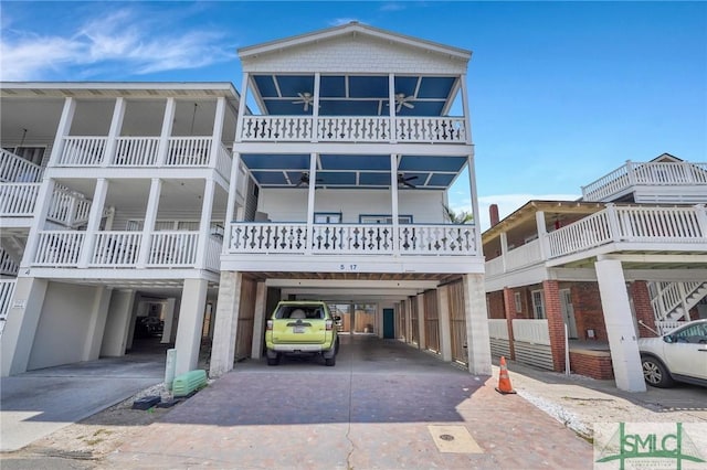 beach home with a carport and driveway