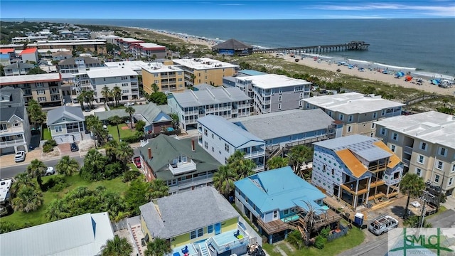 bird's eye view with a beach view and a water view