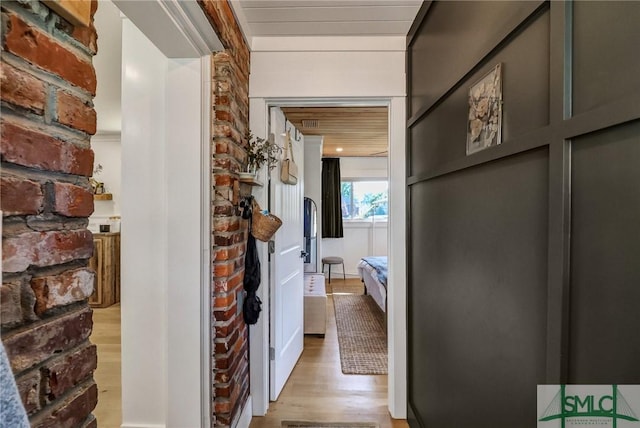 hall featuring wood finished floors