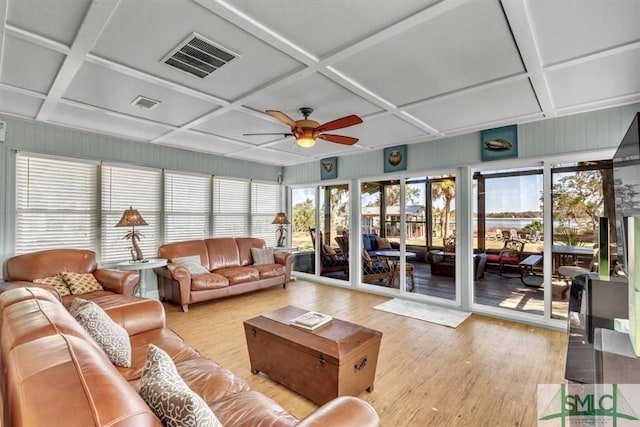 interior space featuring visible vents, coffered ceiling, ceiling fan, and wood finished floors